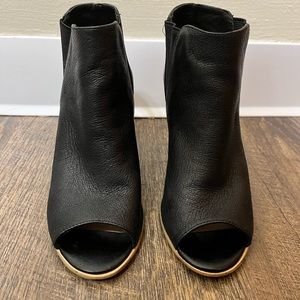 Leather, black Steve Madden peep toe bootie. Size 6